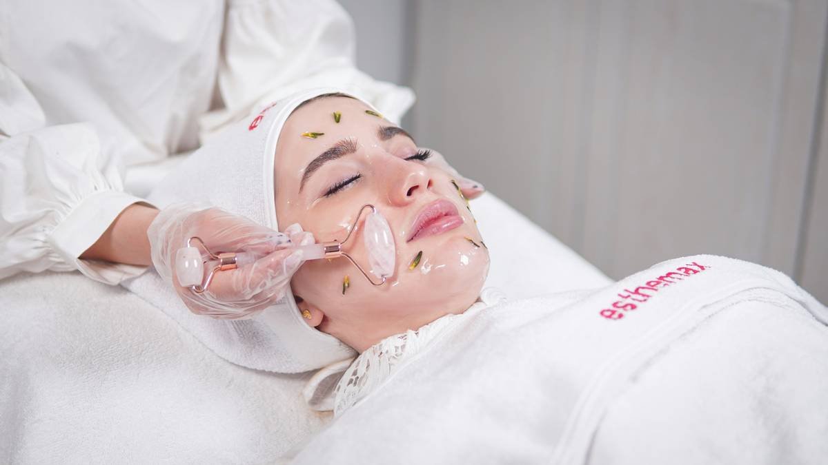 Woman applying daily care moisturizer everyday human oh right after shower